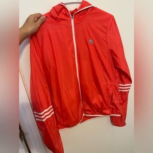 Pink wind breaker. Good condition.